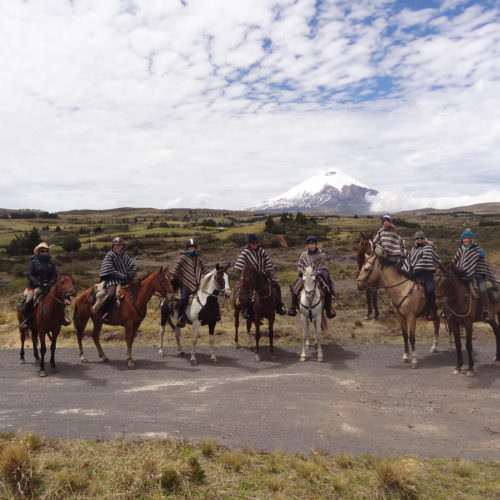 Riders next to Cotopaxi Volcano