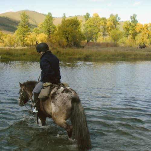 Mongolia riding river