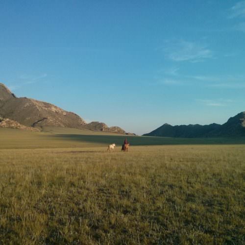 Mongolia riding in hills